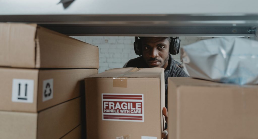 Man getting the fragile box